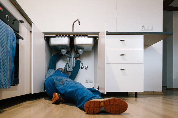 Professional Drain Cleaning technician working in Franklin, MA